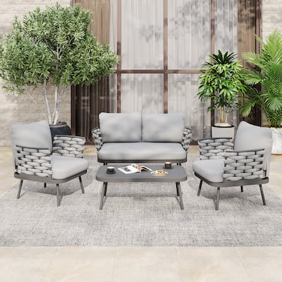 Roomfitters Steel 4-Piece Outdoor Conversation Set with Woven Rope Armrests and Cushions