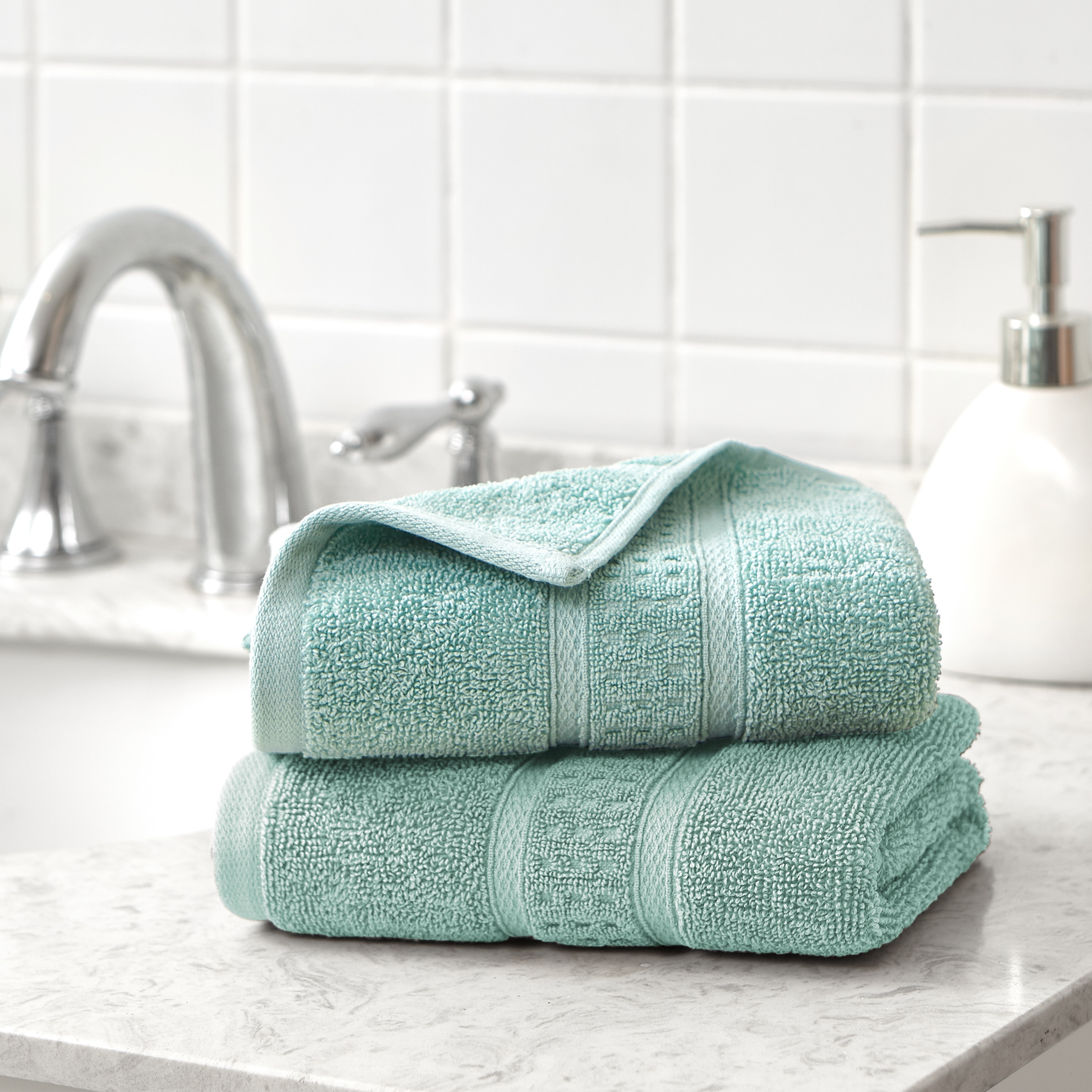 https://ak1.ostkcdn.com/images/products/is/images/direct/f569a1a6dcf2163bf62935472ee151fe71944c51/Nautica-Oceane-Solid-Wellness-Towel-Collection.jpg