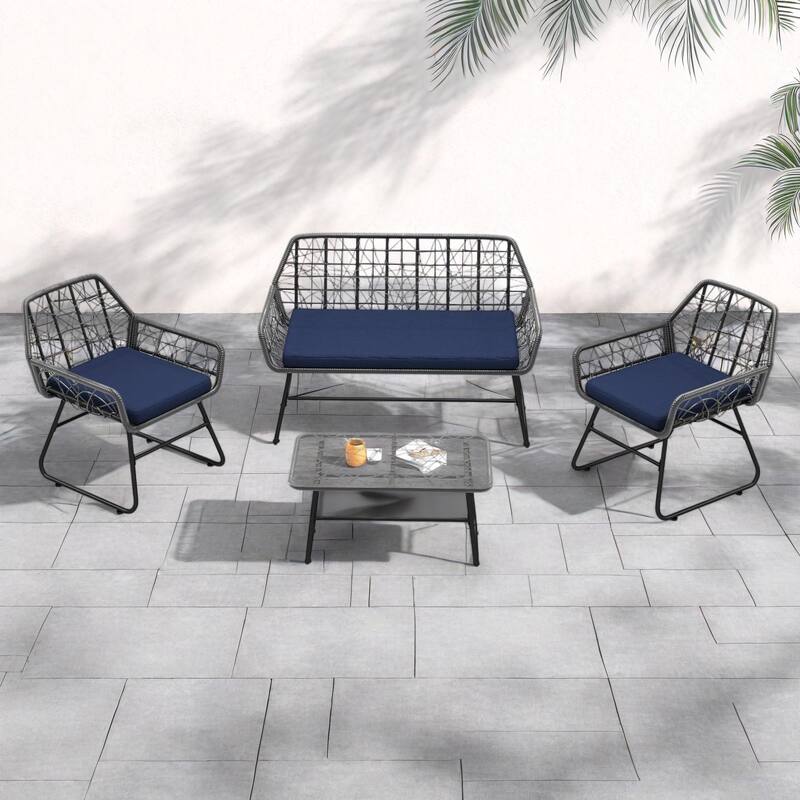 4-Piece Outdoor Woven Rattan Cnversation Sofa Set with Tempered Glass Coffee Table and Waterproof Cushions - Blue