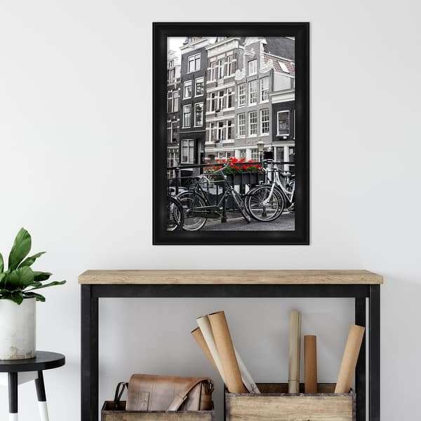 https://ak1.ostkcdn.com/images/products/is/images/direct/f5ae1acd76b33b3e311fe2bbf0ff7fd4b2099676/Amanti-Art-Grand-Black-Narrow-Picture-Frame%2C-Photo-Frame%2C-Art-Frame.jpg?impolicy=medium