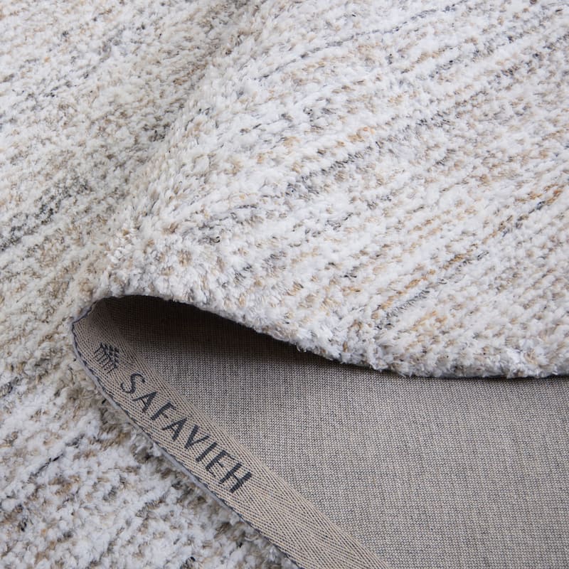 SAFAVIEH Handmade Glory Shag Stergiani Rug