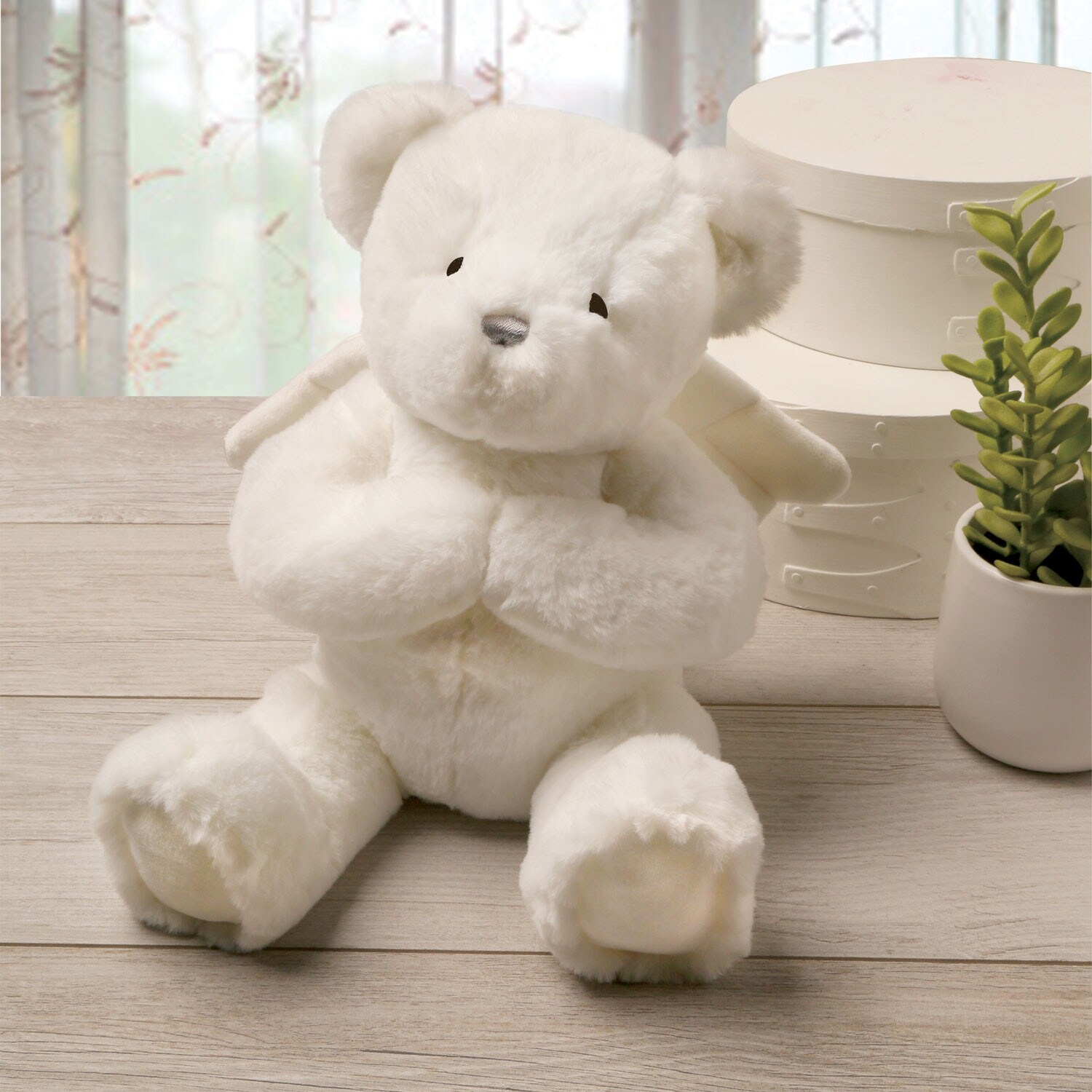 white teddy bear with wings