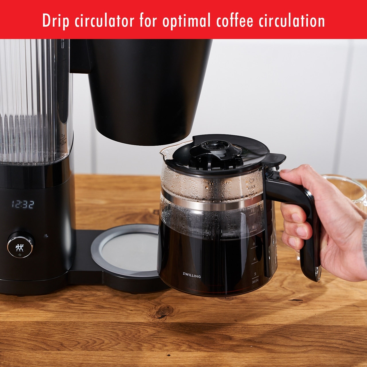 https://ak1.ostkcdn.com/images/products/is/images/direct/f5cbe5cd76e9aee02cfa25e7ce5f7776d2112ba8/ZWILLING-Enfinigy-Glass-Drip-Coffee-Maker-12-Cup%2C-Black.jpg