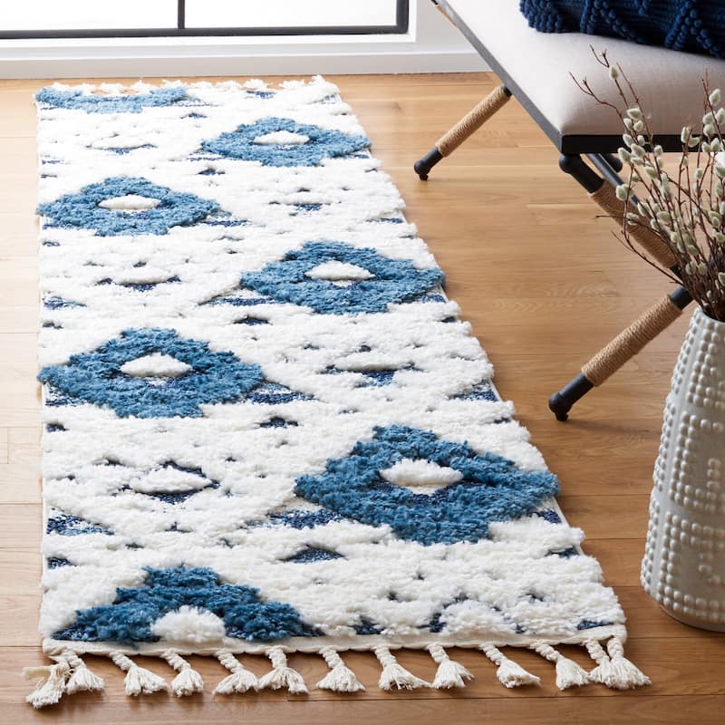SAFAVIEH Moroccan Tassel Shag Kobi 2-inch Thick Rug - 8' Runner - Blue/Ivory