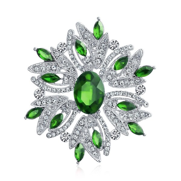 green brooches and pins