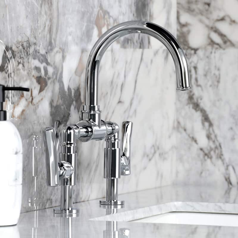 Kingston Brass Hallerbos Two-Handle 4-Hole Deck Mount Bridge Bathroom Faucet with Brass Pop-Up Drain