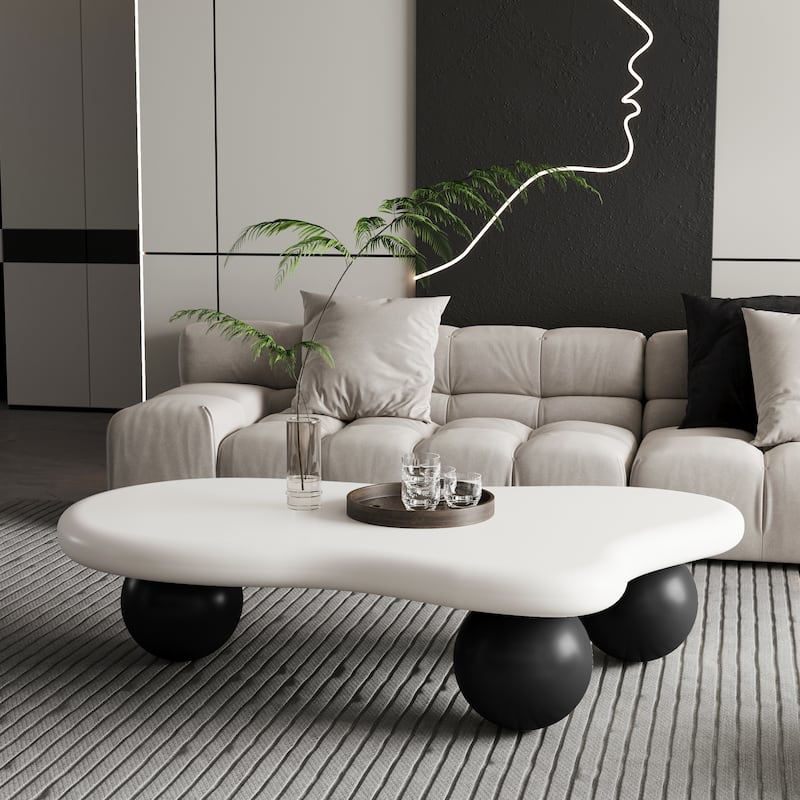 47 Inch Cloud Shaped Coffee Table with 3 Ball Legs for Living Room