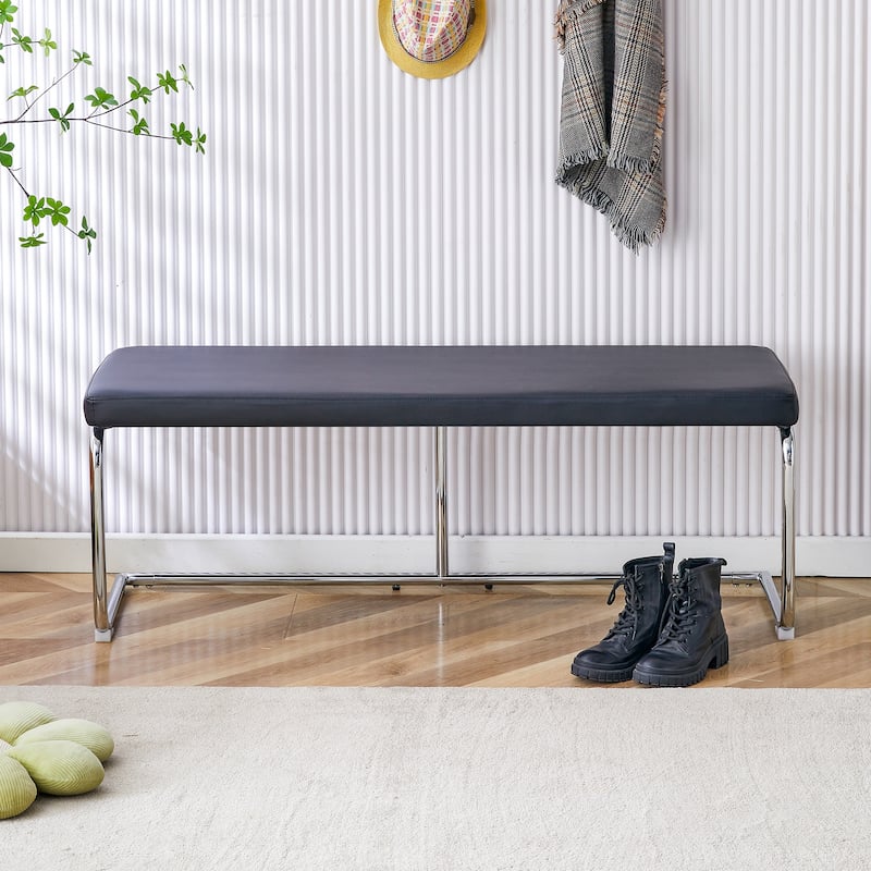 Black shoe changing bench silver metal legs