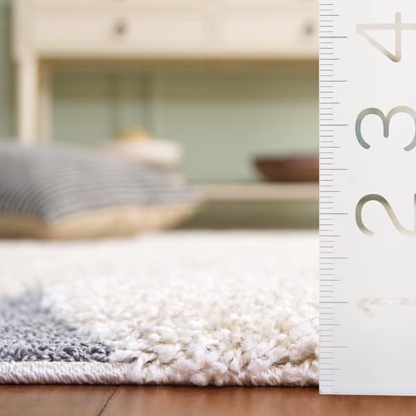 dimension image slide 2 of 4, SAFAVIEH Florida Shag Sigtraud Abstract Waves 1.2-inch Thick Rug
