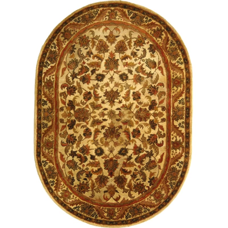 SAFAVIEH Handmade Antiquity Manerva Traditional Oriental Wool Rug - 4'6" x 6'6" Oval - Gold