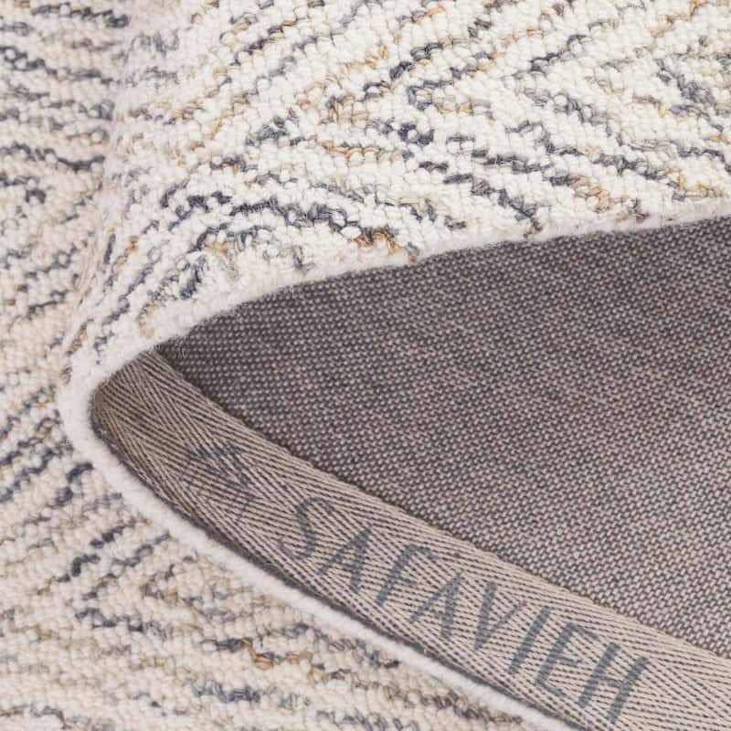 SAFAVIEH Handmade Ebony Herlaug Modern Wool Rug