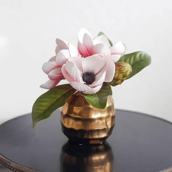 https://ak1.ostkcdn.com/images/products/is/images/direct/f72cb7d6e32ac154b2cc28b44be8cd43a3be9037/FloralGoods-Artificial-Magnolia-Flower-in-Metal-Gold-Vase-8.6%22-Tall.jpg?impolicy=medium