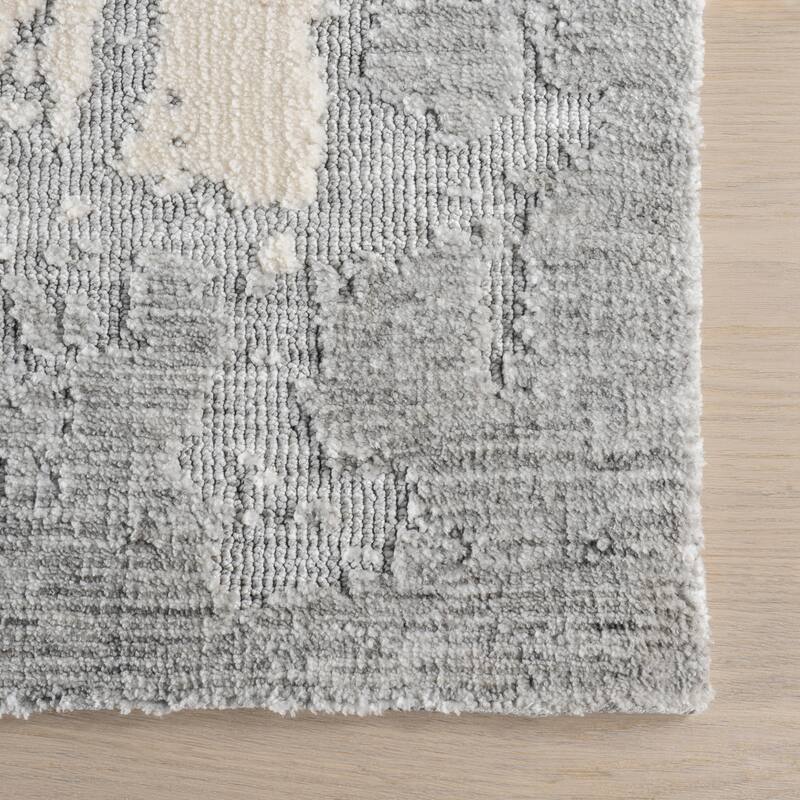 Mera Bordered Wool Area Rug