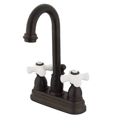 Kingston Brass Restoration Centerset Bathroom Faucet with Pop-Up Drain