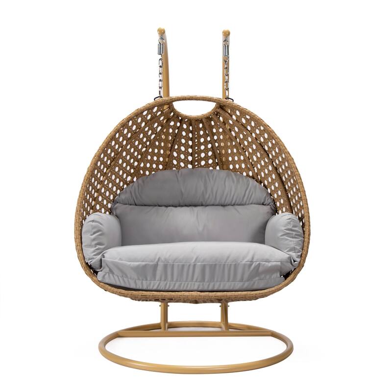 LeisureMod Mendoza 2-Person Hanging Egg Swing Chair - Handcrafted Light Brown Wicker, Patio Hammock Lounger with Cushions - 53"