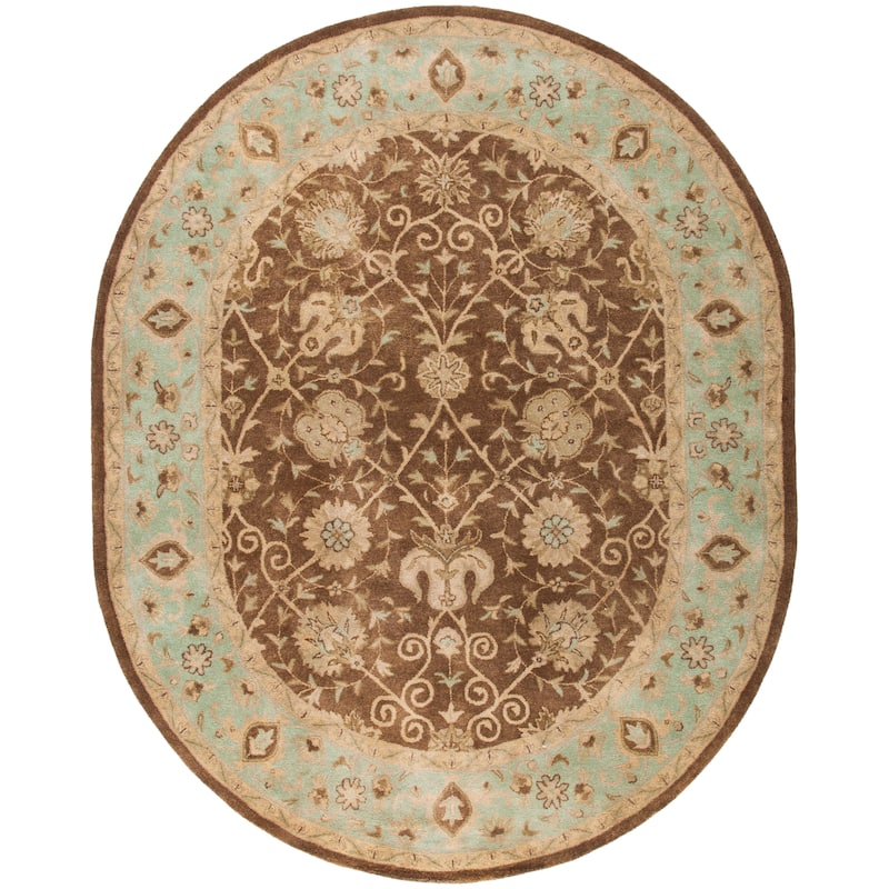 SAFAVIEH Handmade Antiquity Mazie Traditional Oriental Wool Rug - 7'6" x 9'6" Oval - Brown/Green
