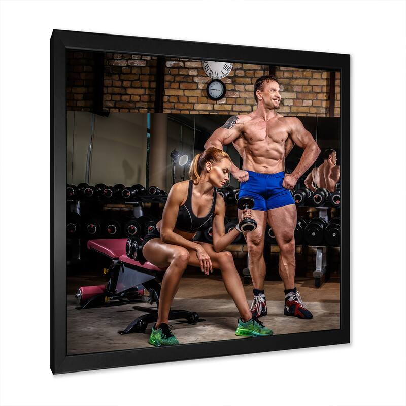 Designart "Sports Couple Is Working Out Gym" Aerobic & Bodybuilding Framed Canvas Prints