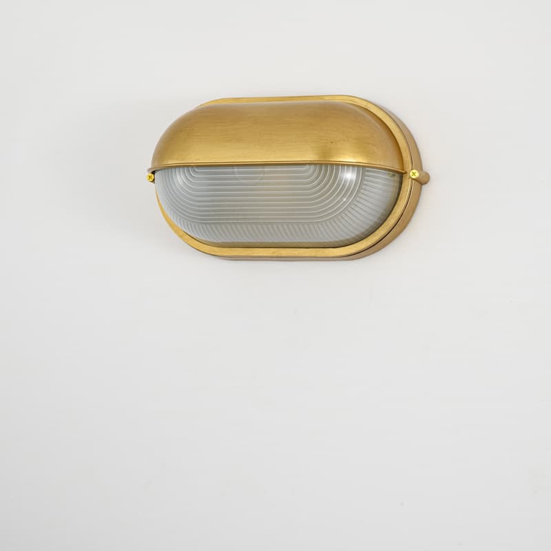 11"W 1-Light Retro 40W Oval Painted Gold Finish Wall Sconce with Clear Rippled Glass - 11.0 in. W x 6.3 in. H x 4.7 in. D