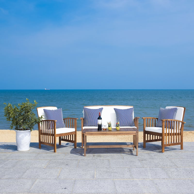 SAFAVIEH Outdoor Rocklin 4-piece Conversation Patio Set - Natural/Beige + Thin StripePillow