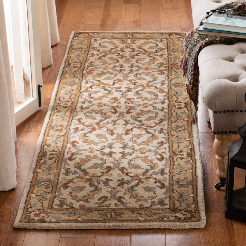 SAFAVIEH Handmade Heritage Annerike Traditional Oriental Wool Rug - 2'3" x 8' Runner - Beige/Gold