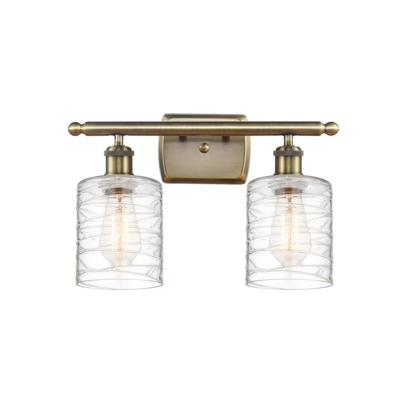 Innovations Lighting 516-2W-9-16 Cobbleskill Vanity Cobbleskill 2 - Antique Brass / Deco Swirl