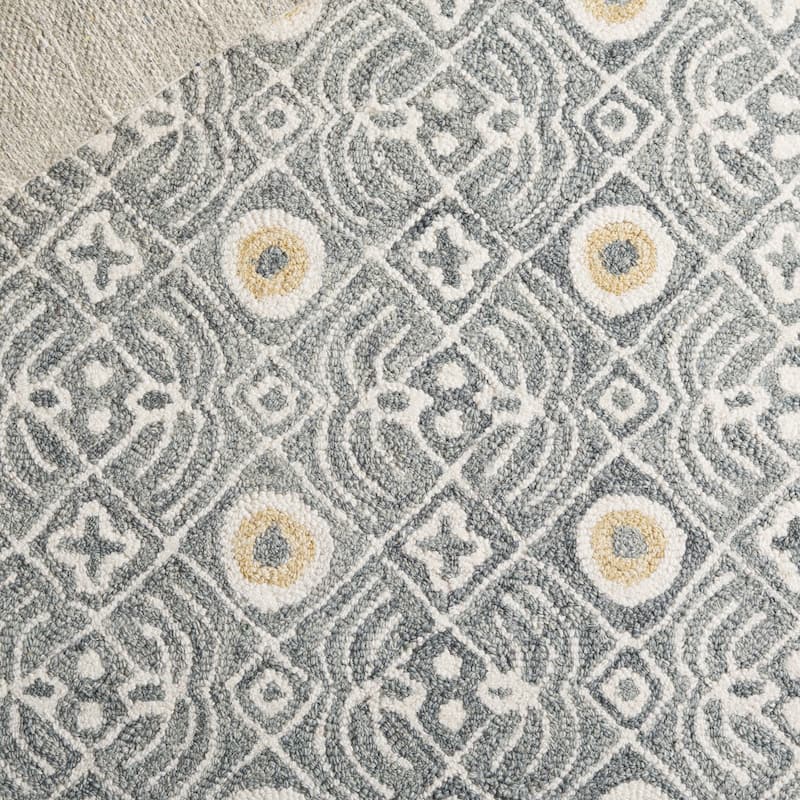 SAFAVIEH Handmade Micro-Loop Reglind Wool Rug