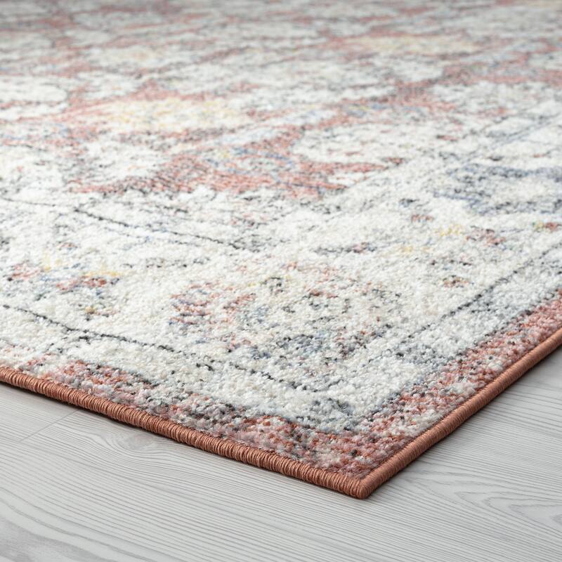Addalyn Oriental Border Area Rug