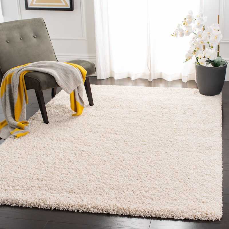SAFAVIEH Evolution Shag Gwenaele Solid 1.8-inch Thick Rug - 4' x 6' - Ivory - Rectangle