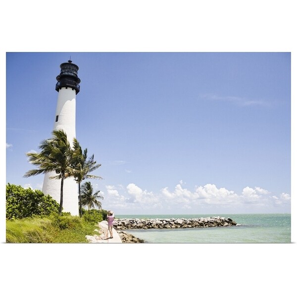 "Lighthouse and tropical palm trees near ocean" Poster Print