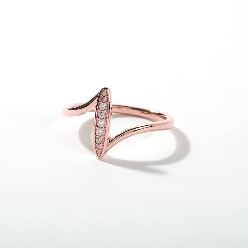 1/20ct TDW Diamond Bypass Fashion Ring in 10k Gold for Women