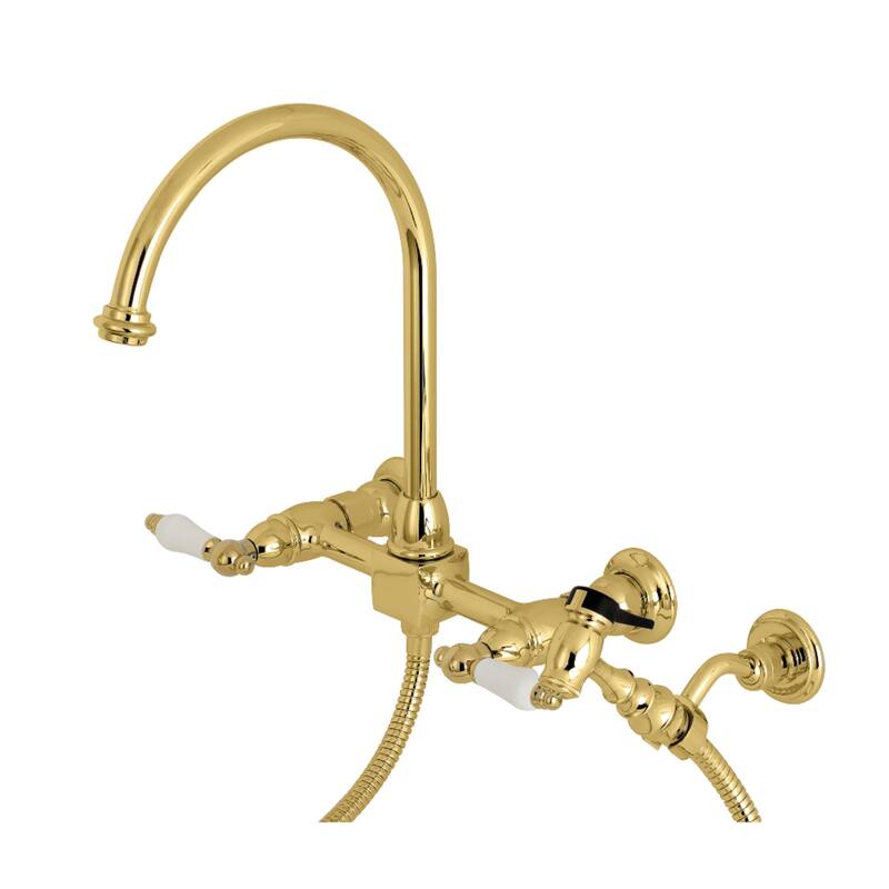 Kingston Brass Restoration Wall Mount Bridge Kitchen Faucet with Brass Sprayer - Polished Brass