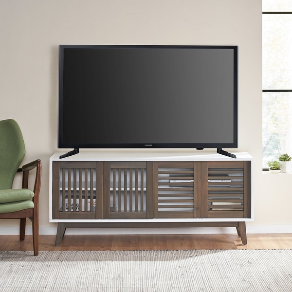 Leverick Mid-Century Modern 4 Door TV Stand with Storage by Christopher Knight Home - 56.00" W x 16.00" D x 24.25" H. Opens flyout.