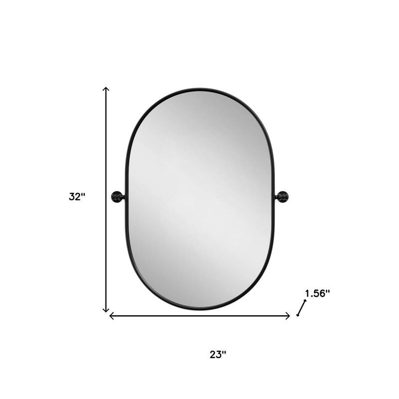 HomeRoots 32" Black Aluminum Oval Adjustable Tilting Framed Accent Mirror - 23.00 in. x 32.00 in. x 1.56 in.