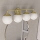 preview thumbnail 1 of 13, Hunter Hepburn 4-Light Bathroom Vanity Wall Light - Damp Rated - Vintage, Mid-Century Painted Modern Brass