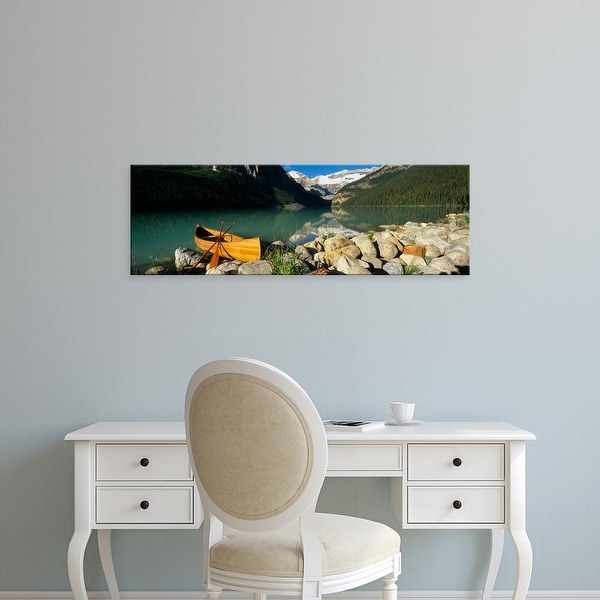 Easy Art Prints Panoramic Image 'Canoe at the lakeside, Lake Louise, Banff National Park, Alberta, Canada' Canvas Art