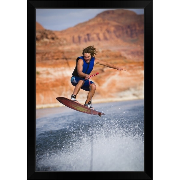 "Man wakeboarding" Black Framed Print