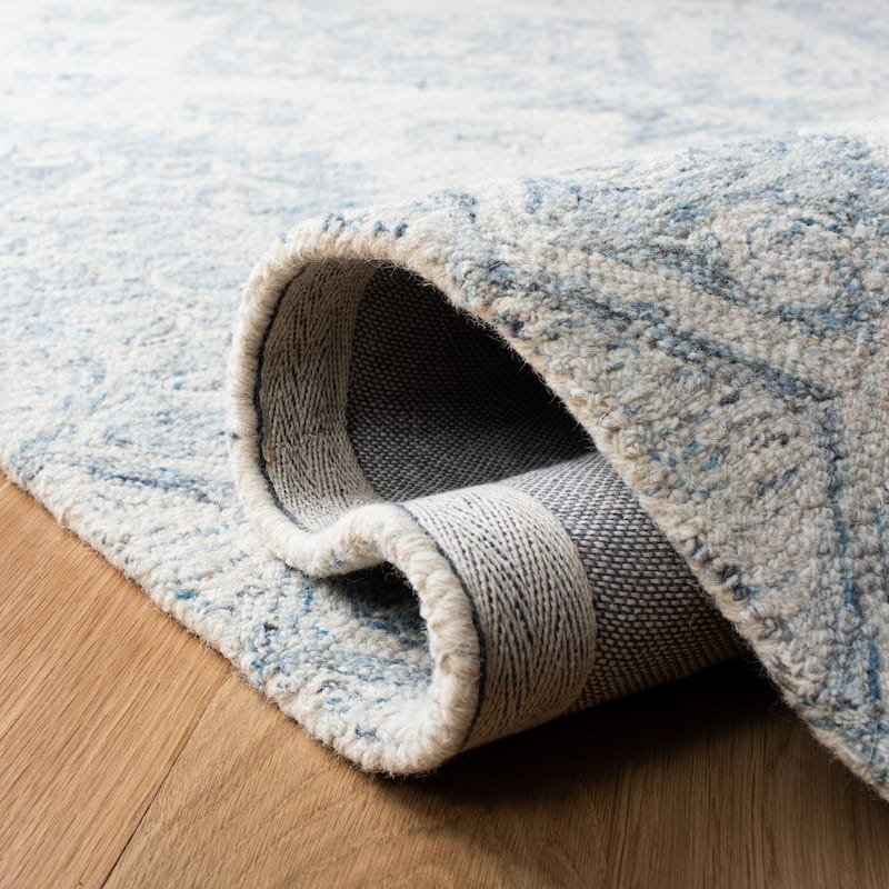 SAFAVIEH Handmade Micro-Loop Stella Modern Wool Rug - 5'