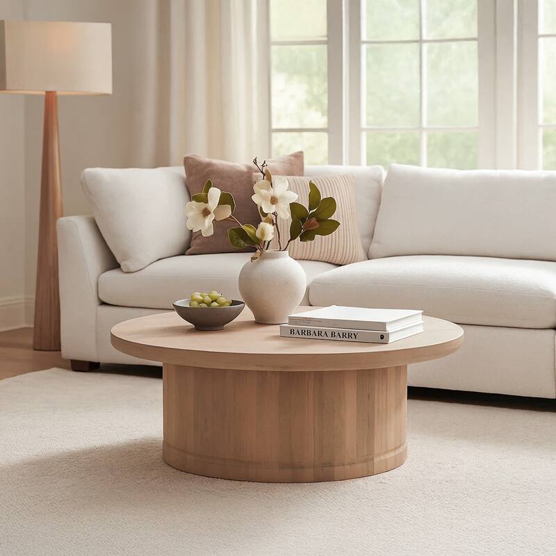 Bela Coffee Table 47 Inch Round Top Handcrafted Beige Mango Wood Pedestal Base
