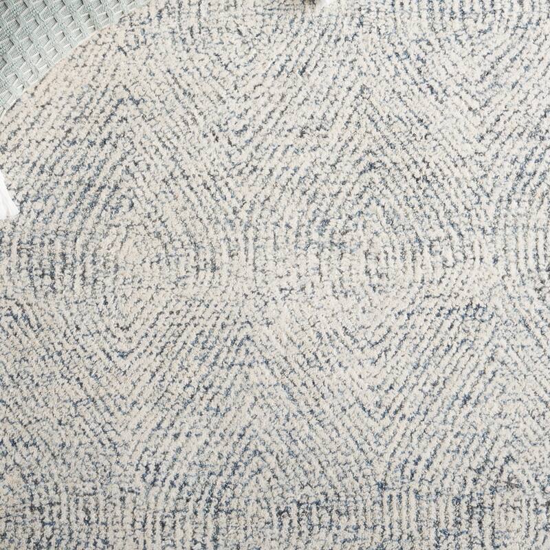 SAFAVIEH Handmade Abstract Leonide Modern Wool Rug