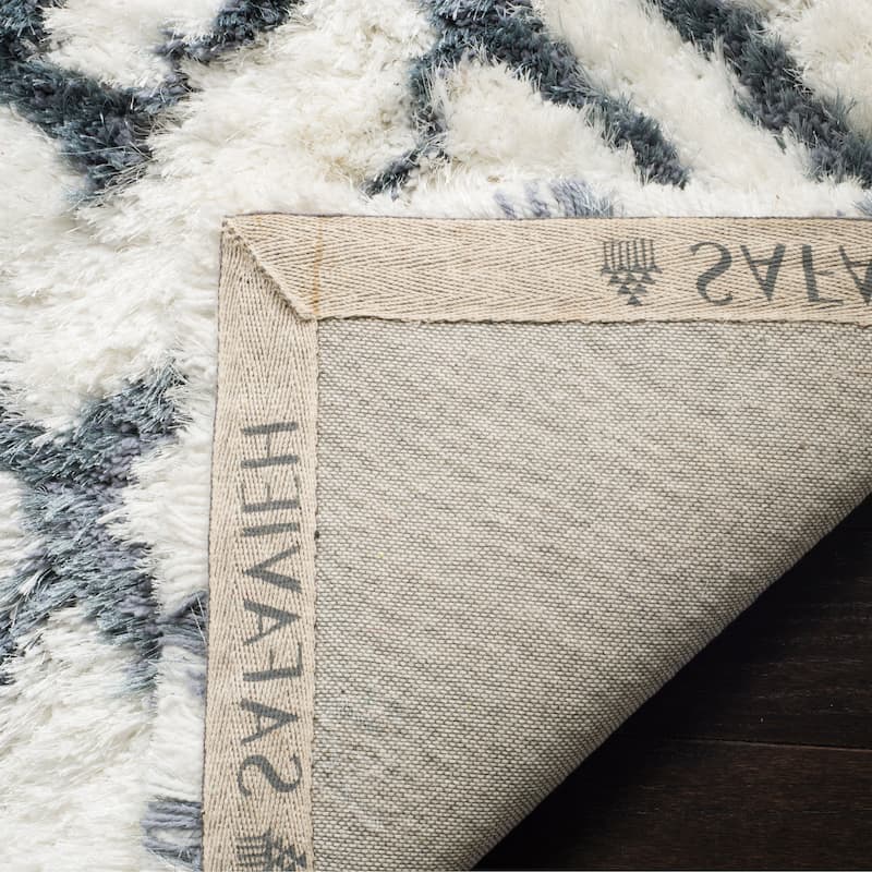 SAFAVIEH Handmade Toronto Shag Delaney Polyester Rug