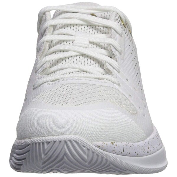 white and gold under armour volleyball shoes
