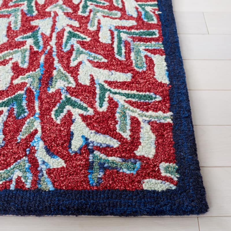 SAFAVIEH Handmade Capri Ilianka Wool Rug