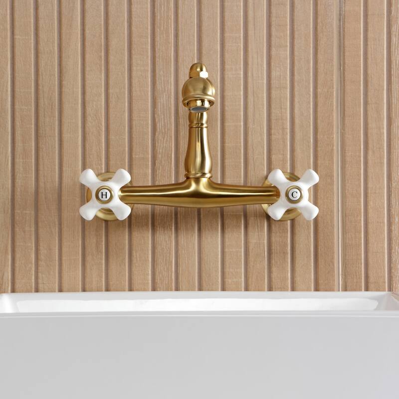 Kingston Brass English Country Two-Handle 2-Hole Wall Mount Bathroom Faucet