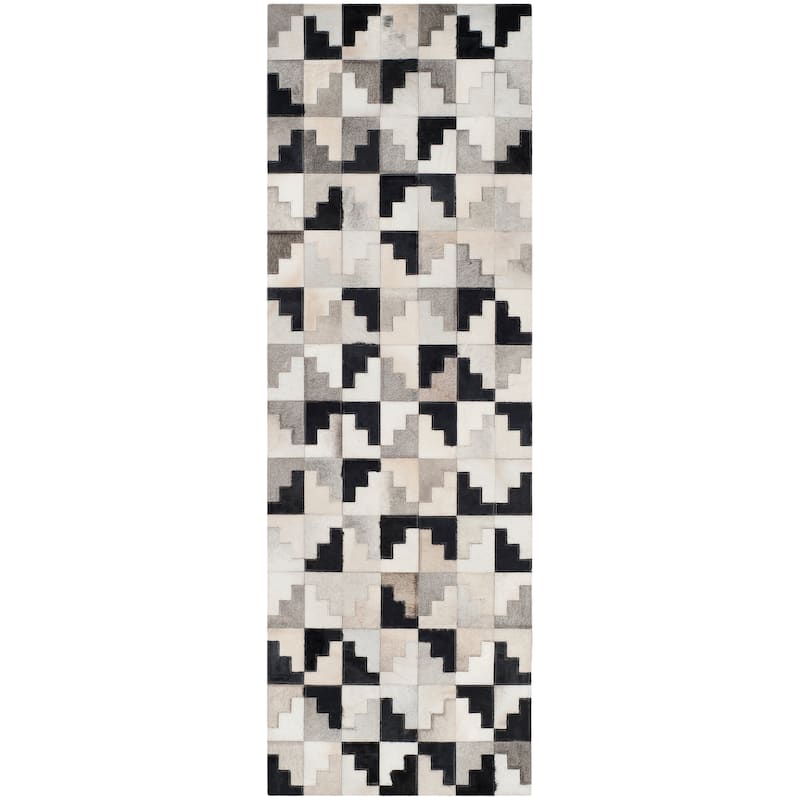 SAFAVIEH Handmade Studio Leather Rengin Modern Leather Rug