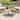 Roomfitters Modern Round Coffee Table with Teak-Style Wood Surface and Sleek Metal Base, Teak