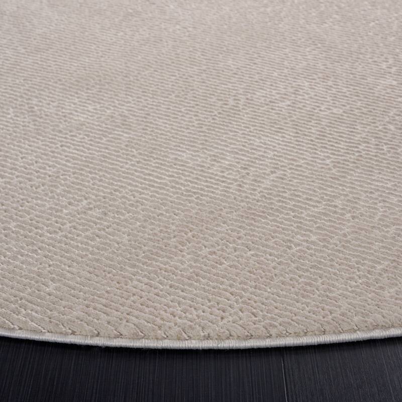 SAFAVIEH Revive Avie Solid Rug