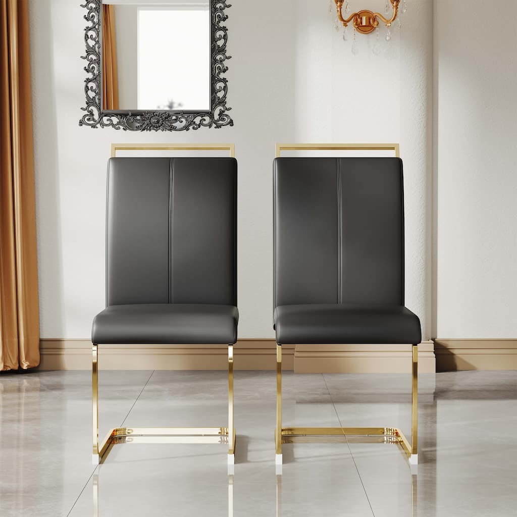 A set of 4 artificial leather dining chairs