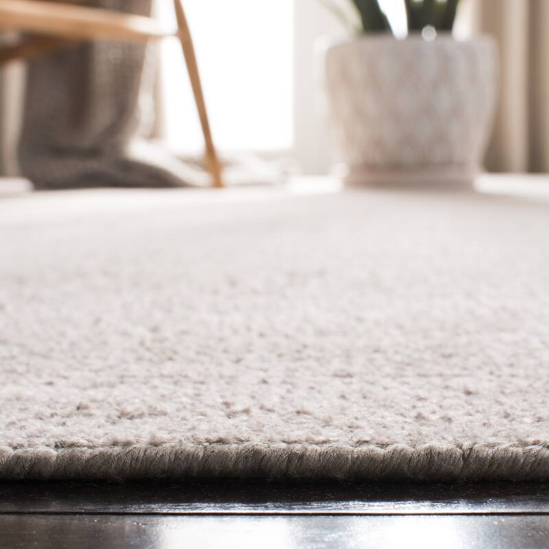 SAFAVIEH Hand-knotted Stone Wash Janina Modern Wool Rug