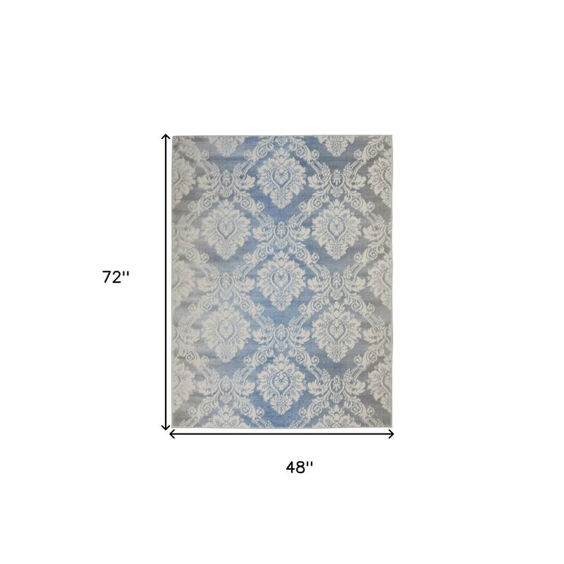 Doziq Distressed Non Skid Stain Resistant Low Pile Area Rug By HomeRoots - 72' X '48' X '0.25