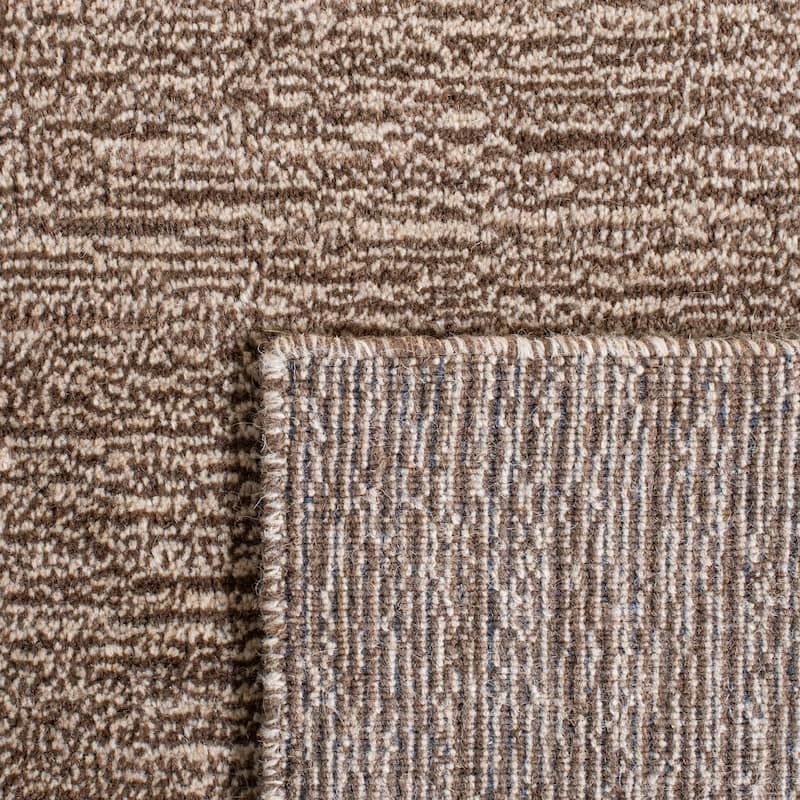 SAFAVIEH Handmade Himalaya Palm Border Modern Wool Rug
